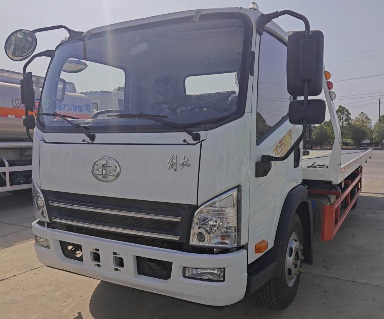 FAW small tow truck flatbed in Africa 4ton towing capacity