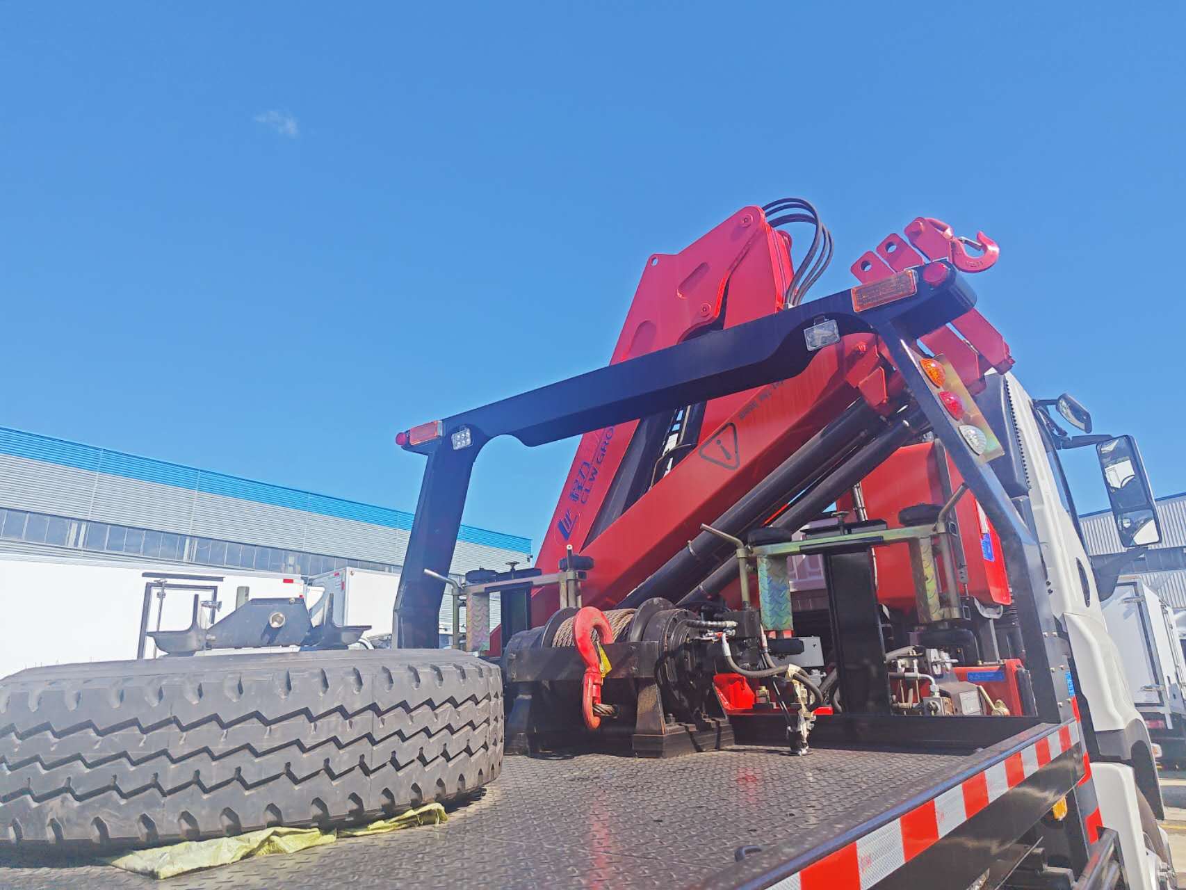 ISUZU giga tow truck with crane fold boom back