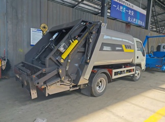 compactor garbage truck turn over unit working